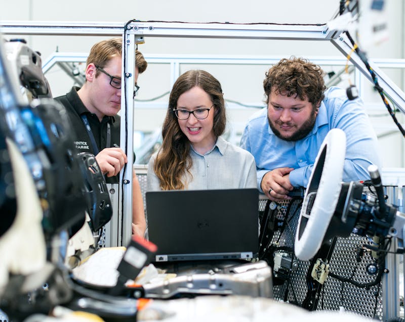 car technology engineers working